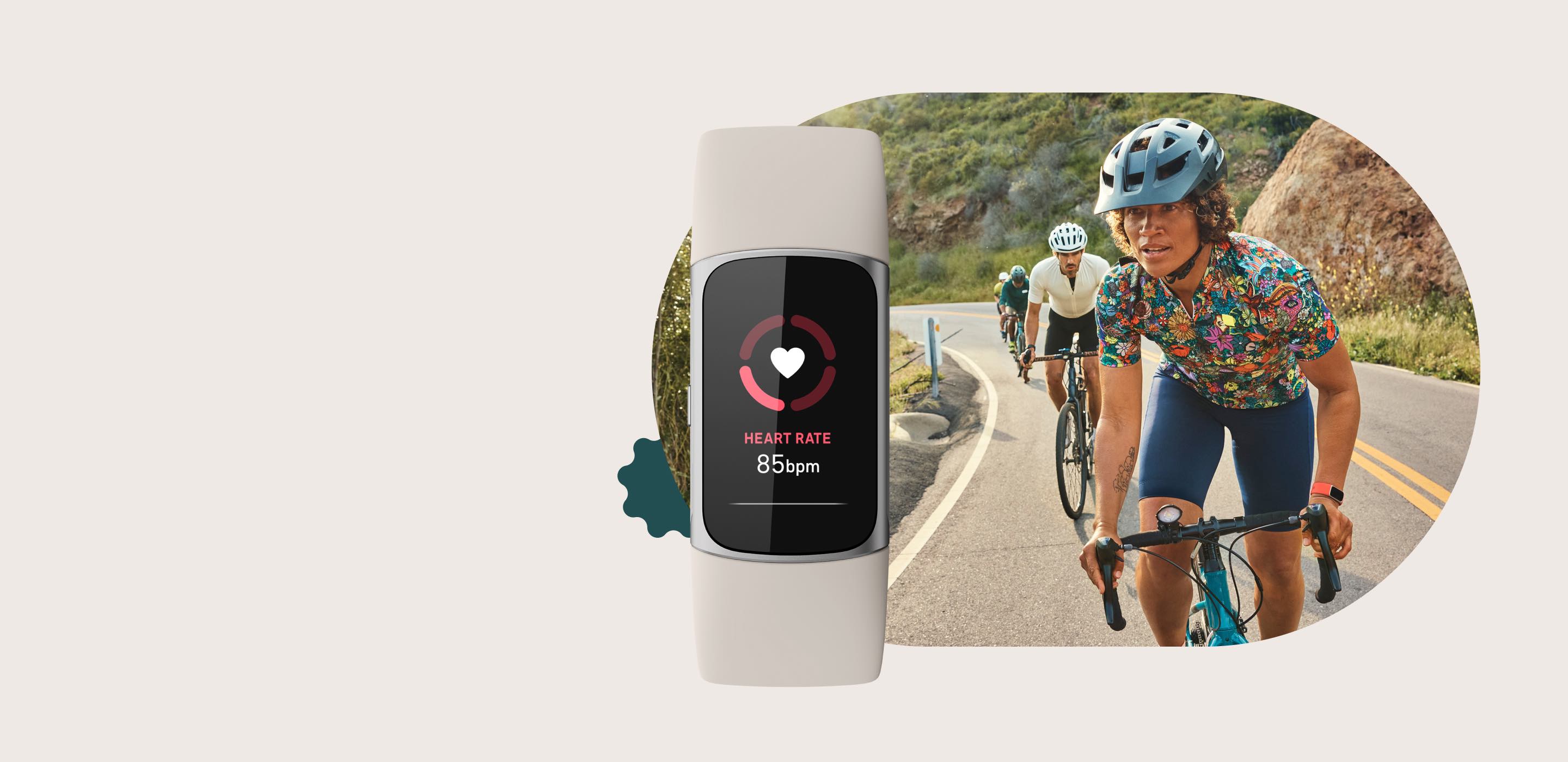 woman biking with heart rate tracker active